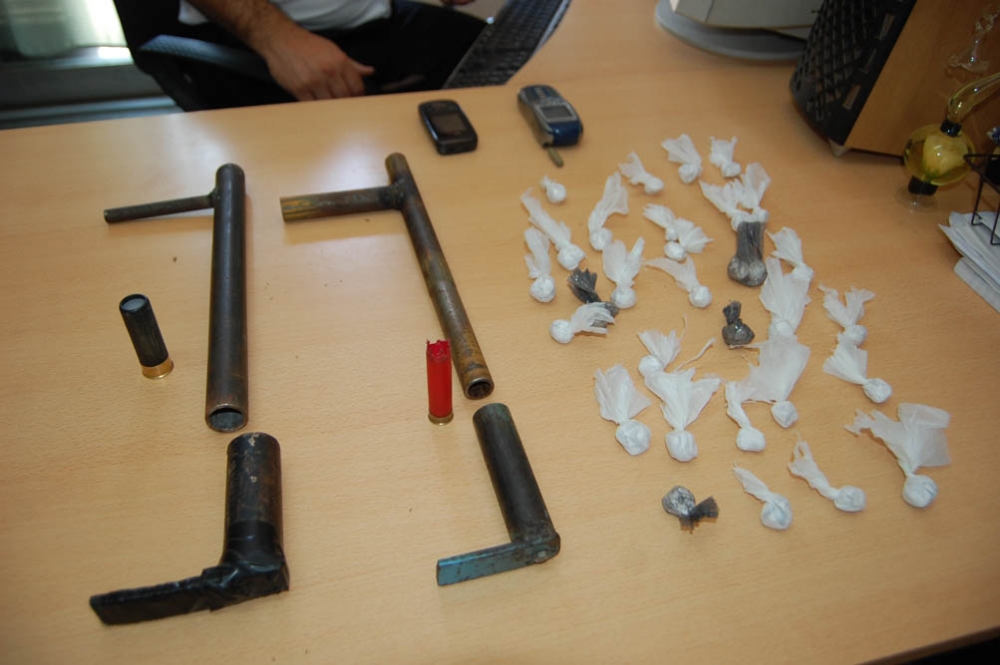 drogas y armas tumberas