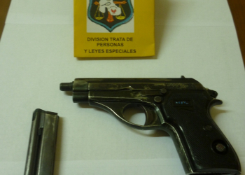 TENÍA UN ARMA DE FUEGO