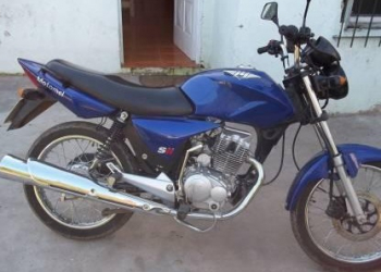 MOTOCICLETA ABANDONADA
